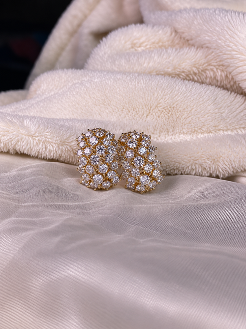 Gold-plated Xuping crystal cluster stud earrings featuring sparkling clear stones in an elegant statement design.